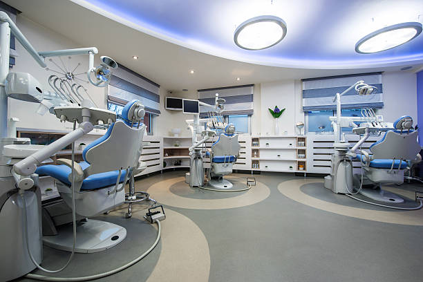 Modern corporate dental office with multiple treatment rooms and digital dental equipment