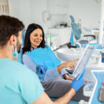 Dentist reviewing comprehensive dental treatment plan and cost estimate with patient at Aspen Dental